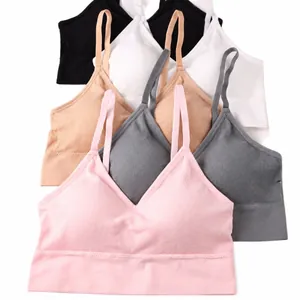 Set of seamless U-neck ribbed sports bras in multiple pastel colors for yoga and fitness.