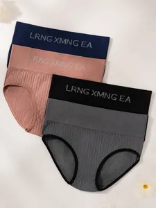 Detail of 4-pack women's high-waisted ribbed panties with letter waistband