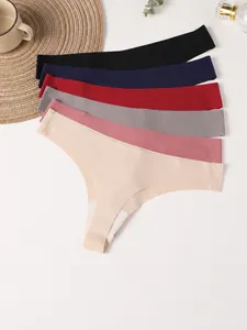 Detailed view of six colorful seamless ice silk thongs for women yoga and fitness wear