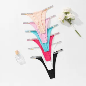 Sexy ribbed thongs for women with rhinestone straps and metal accents in multiple colors