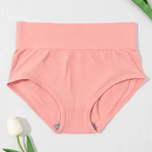 Detailed close-up view of pink high-waist tummy control panties with honeycomb texture fabric