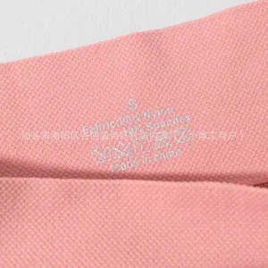 Close-up view showing the honeycomb fabric texture and printed care label on seamless briefs