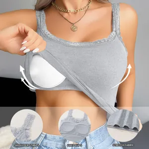 Detail view of grey tank top showing fixed padding, lace straps, and stretch fabric.