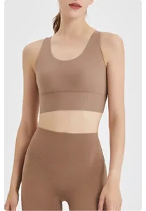 Detailed view of a coffee-colored seamless high-waist yoga sports set on a model.