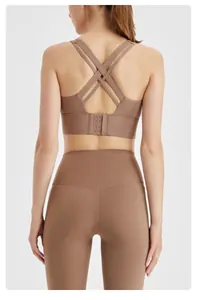 Back view of brown sports bra featuring elastic cross-back straps and seamless design