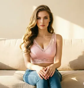 Close-up of pink lace bralette on model, highlighting comfort and elegant design