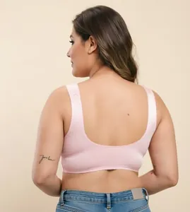 Detailed back view of a pink wireless vest-style bra with elegant lace trim design