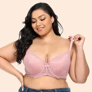 Close-up detail of a pink plus size floral lace underwire bra worn by a model