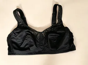 Detail view of black ultra-thin lace bra with wide adjustable straps for comfort