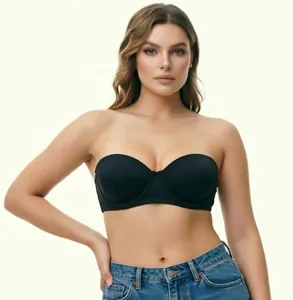 Seamless black strapless bra with thin cups for large sizes shown on a female model