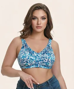Close-up of a plus-size front-closure bra with blue floral print on a model