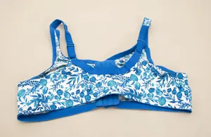 Close-up showing the blue floral print and adjustable straps of this comfort bra.