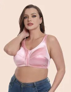 Detail view of pink satin plus size front-closure bra featuring wide straps and full cup design