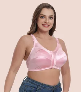 High-quality detail shot of a plus size pink satin front-closure wireless bra on a model