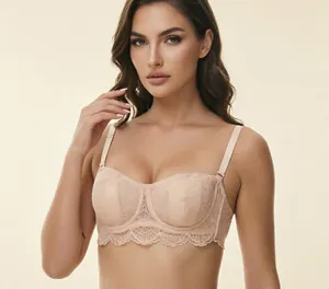 Detailansicht eines hautfarbenen 1/2-Cup-Spitzen-BHs mit Bügel und Blumenstickerei