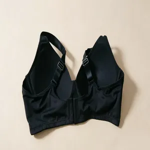 Back detail of a comfortable black wide-strap bra showing adjustable hook-and-eye closure