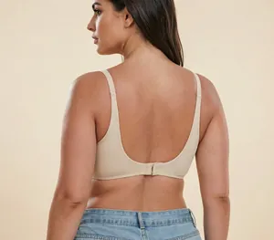 Detailed back view of a beige seamless bra with adjustable straps and hook-eye closure.