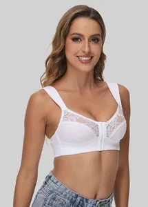 Detail view of a white wireless lace bra featuring front closure and wide straps on model