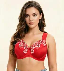 Detailed view of red lace floral embroidery on a supportive wide strap plus size bra