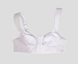 Close-up of white wire-free lace bra featuring functional front-closure and wide straps