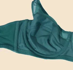 Macro detail of deep green plus size mesh bra with breathable fabric and underwire support