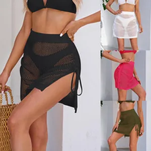 Sexy hollow out knit mesh beach cover-up mini skirt with side slit and drawstring detail