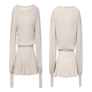 Detail showing front and back view of beige lantern sleeve knit top with cinched waist
