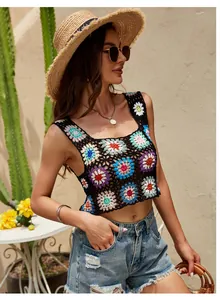 Close-up of bohemian crochet crop top with colorful floral patterns and square neck