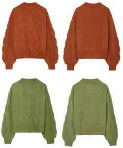 Detail display of cable knit mock neck sweaters showing front and back in two colors