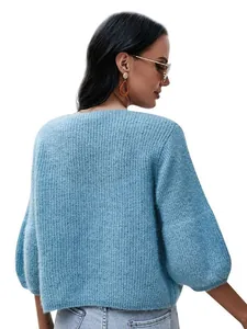 Back view of light blue chunky knit sweater with stylish three-quarter puff sleeves