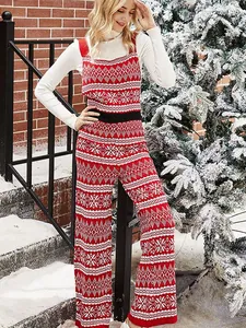 Combinaison de Noël tricotée rouge festive avec motif flocon blanc et jambes larges