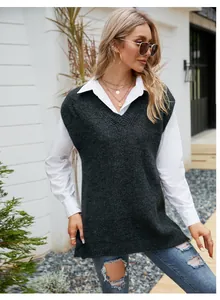 Close-up of a charcoal grey V-neck knitted sweater vest styled over a white shirt