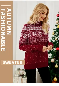 Close-up of red high-neck Christmas sweater with white snowflake jacquard patterns