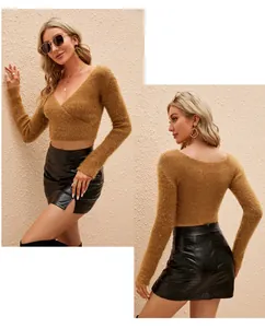 Detail view of a slim fit V-neck mohair cropped sweater with long sleeves in tan