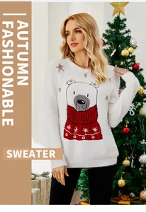 Detailed view of white Christmas sweater with embroidered bear and snowflake scarf