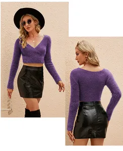 Close-up of a purple mohair cropped sweater featuring a V-neck cross design and soft texture