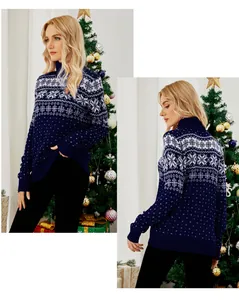 Detailed macro view of navy blue high-collar Christmas sweater with white snowflake motifs