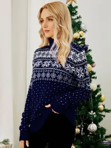 Navy blue turtleneck Christmas sweater with snowflake and reindeer jacquard pattern.