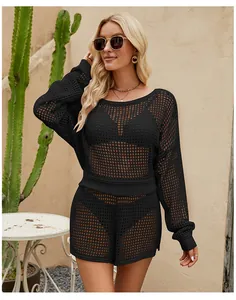 Mannequin portant un ensemble deux pièces en maille ajourée noire avec haut et short