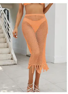 Falda larga de ganchillo naranja sexy con detalles de flecos y lazo lateral para mujer