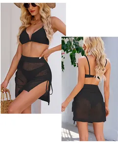 Detailed view of sexy black mesh mini skirt with side drawstring and hollow out design.