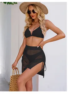 Chic black hollow-out mini skirt with high side slit and drawstring for beach outings