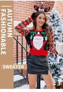 Vue détaillée du pull de Noël pour femme avec broderie Père Noël et motifs festifs mignons