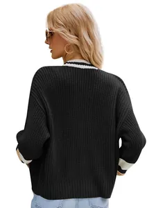 Stylish back view of black V-neck loose knit sweater with white striped ribbed cuffs