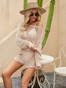Ensemble deux pièces en tricot ajouré abricot avec haut à manches longues et short