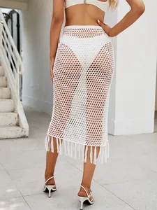 Falda larga de ganchillo calada blanca con flecos y borlas para playa verano mujer