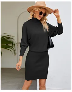 Detail of black high-neck ribbed knit dress worn with elegant accessories