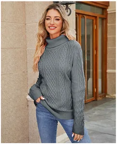 Detail view of a stylish gray cable-knit turtleneck sweater for women in autumn fashion