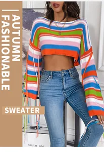 Close-up detail of a rainbow striped cropped sweater with unique fringe sleeve accents