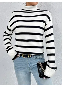 Close-up view of a striped turtleneck knit sweater featuring detailed ribbed cuffs.